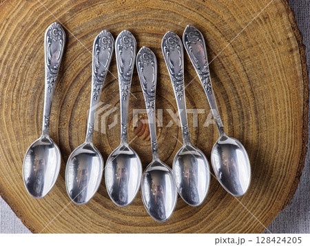 A set of vintage tea spoons made of nickel silver covered with silver. The spoons were made in the USSR. 128424205