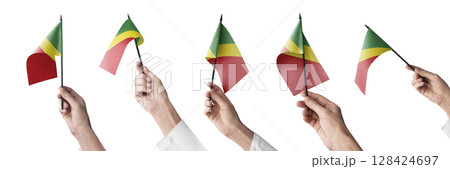 The Congo flag in hand in different angles on a white background 128424697