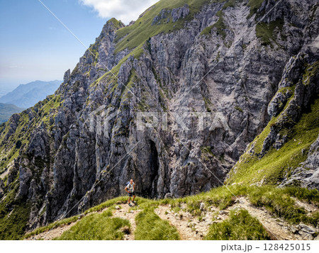 Rugged Alpine Peaks And Verdant Valleys In The Grigna Massif: Scenic Mountain Landscape In Lombardy Region Of Northern Italy Near Lake Como 128425015