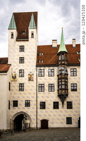 Alter Hof - Historic Old Court In Munich With Medieval Architecture And Tower: Beautiful Facade With Red Tiled Roofs, Green Turrets, And Decorative Windows In The Heart Of The Bavarian Capital Near Alter Hof - Historic Old Court In Munich With Medieval Architecture And Tower: Beautiful Facade With Red Tiled Roofs, Green Turrets, And Decorative Windows In The Heart Of The Bavarian Capital Near 128425108