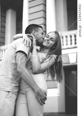 A Couple Embracing in Stunning Black and White Photography Capturing True Emotion 128425402