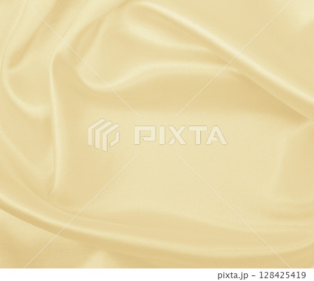 Smooth elegant golden silk or satin luxury cloth texture as wedding background. Luxurious background design. In Sepia toned. Retro style 128425419