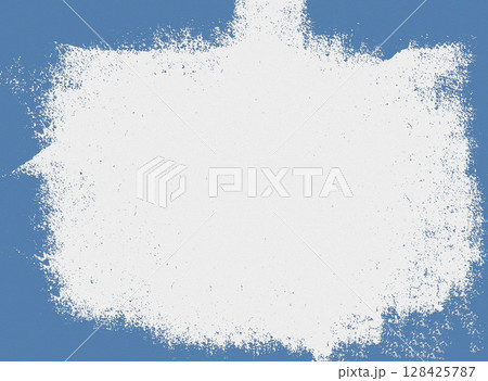 White paint splashing on blue background creating textured frame 128425787