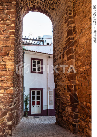 The city gate building, Torreao das Portas da Cidade in the city centre of Silves, Portugal, Europe 128426360
