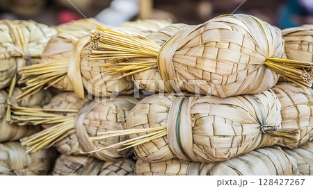 Natural Woven Palm Leaf Bundles Rustic Beige Texture Background Tan Dark Straw Craft Rural Retro 128427267
