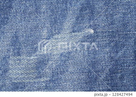 Blue jeans texture background. Denim background. Blue jeans texture background. Denim background. 128427494
