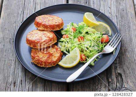 Hot Smoked salmon burgers, patties and coleslaw Hot Smoked salmon burgers, patties and coleslaw 128428327