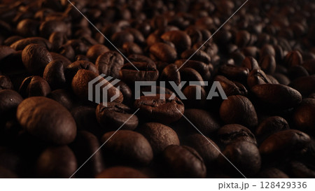 Aromatic Rich Coffee Beans Roasting. Caffeine Energy. Brazilian Arabica Harvest Aromatic Rich Coffee Beans Roasting. Caffeine Energy. Brazilian Arabica Harvest 128429336