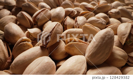 Organic Salted Pistachios Close-Up With Smooth Dolly Movement.high-Protein Snack Organic Salted Pistachios Close-Up With Smooth Dolly Movement.high-Protein Snack 128429382