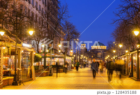 People walk along the Vitosha Boulevard in the city of Sofia 128435188
