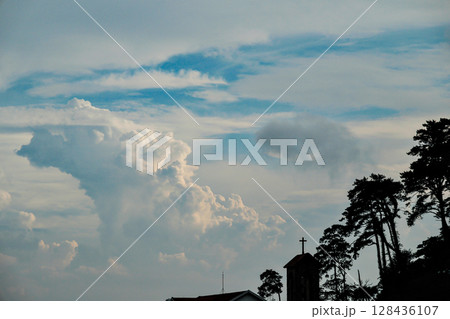 Fluffy White Clouds Above a Quiet Mountain Village_Tam Dao, Vietnam 128436107
