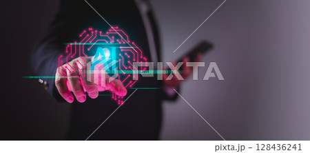 Businessman using virtual brain interface to control AI technology, symbolizing innovation, ethical artificial intelligence, data security, and responsible digital transformation. 128436241