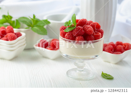 Mascarpone cream with fresh raspberries. Mascarpone cream with fresh raspberries. 128442311