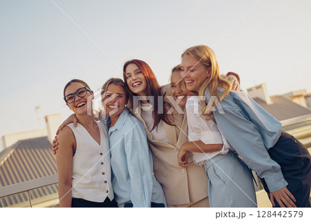 A Joyful and Heartwarming Friendship Moment Captured Amidst the Beauty of the Outdoors A Joyful and Heartwarming Friendship Moment Captured Amidst the Beauty of the Outdoors 128442579