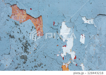 light blue concrete wall texture. Rough stone texture. Stone background. Cracked paint and plaster. 128443218