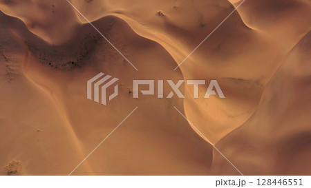 Aerial top view on sand dunes in desert 128446551