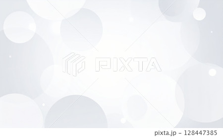 Bright white abstract background with glowing defocused blue and silver Christmas bokeh circles 128447385