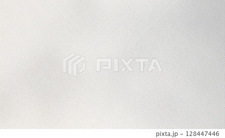 A vintage, rough paper texture provides a blank, light cream backdrop, reminiscent of old parchment or aged fabric 128447446