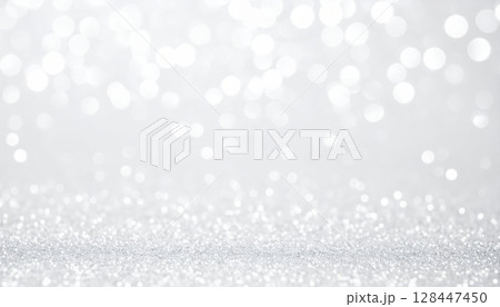Abstract silver Christmas background with blurred snowflakes and glitter bokeh 128447450