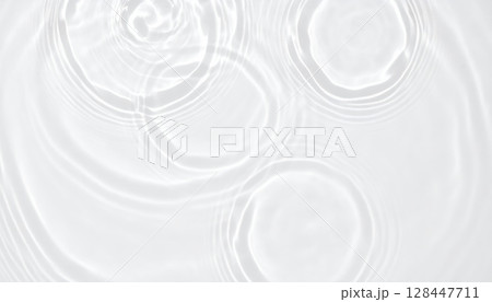 White silk fabric with a subtle winter-like texture and a cold, grunge gray surface pattern White silk fabric with a subtle winter-like texture and a cold, grunge gray surface pattern 128447711