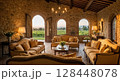 Luxury Mediterranean villa interior with stone arches and elegant furniture overlooking countryside 128448078