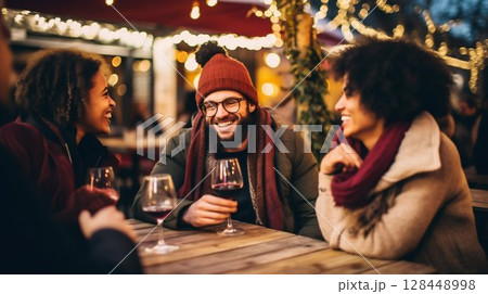 Friends Enjoying Red Wine on Winter Terrace at a Restaurant. Generative ai Friends Enjoying Red Wine on Winter Terrace at a Restaurant. Generative ai 128448998