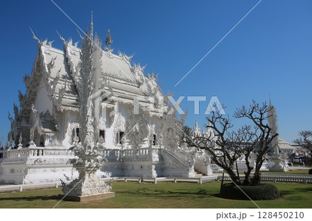 the exterior of temple in wat rong khun or so called white temple in chiang mai. one of landmark in thailand  128450210