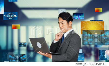 パソコンを使う男性と映像イメージ 画像生成AI パソコンを使う男性と映像イメージ 画像生成AI 128450518