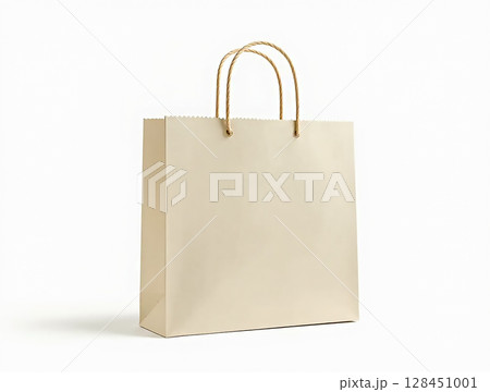 Simple kraft paper bag with twisted handles for shopping or gifting displayed against a minimalist background Simple kraft paper bag with twisted handles for shopping or gifting displayed against a minimalist background 128451001