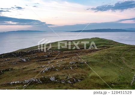 Aerial view of Dunmore Head by Portnoo in County Donegal, Ireland. Aerial view of Dunmore Head by Portnoo in County Donegal, Ireland. 128451529