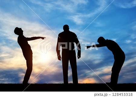 Silhouettes of two men laughing at a sad man pointing a finger at him. 128453318