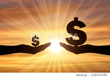 Silhouette of two hands, in one hand a large symbol of Dollar. In the second hand is a small symbol of the dollar 128453395