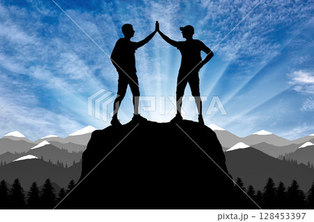 Silhouette of two happy climber conquered the top. 128453397