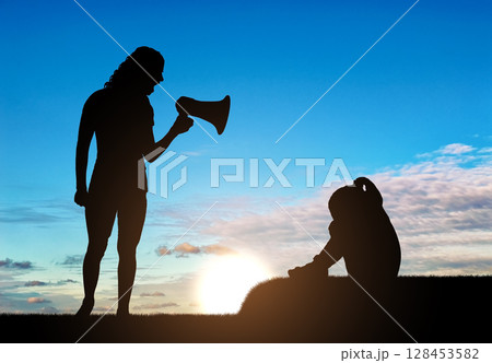 A little girl is crying and her mother screams at her into the loudspeaker, teaches her discipline 128453582
