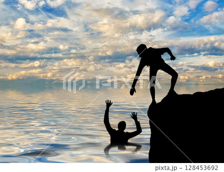 A sinking and saving man, offers a helping hand A sinking and saving man, offers a helping hand 128453692