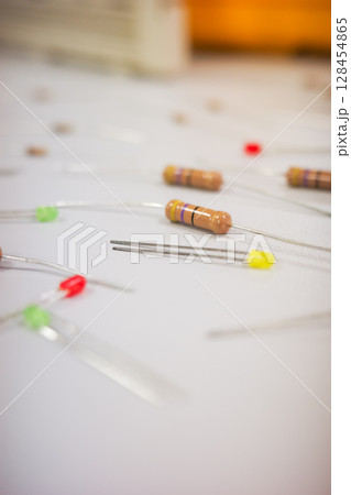 Close-up of electronic components on a white background 128454865