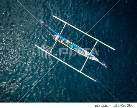 Aerial view of two fisher boat in the turquoise waters in Bali, Indonesia Aerial view of two fisher boat in the turquoise waters in Bali, Indonesia 128456066
