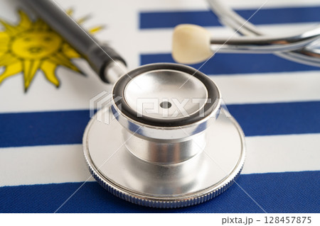 Stethoscope on Argentina flag, business and finance. 128457875