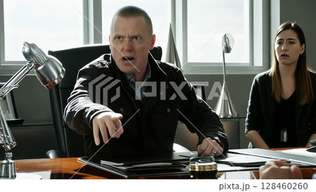 Boss yells at subordinates, boss gives dressing down at work. Negative boss yells at employees. Office conflict escalating as furious manager yells and points his finger during tense business meeting Boss yells at subordinates, boss gives dressing down at work. Negative boss yells at employees. Office conflict escalating as furious manager yells and points his finger during tense business meeting 128460260