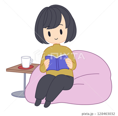 クッションに座って本を読む女性 128463032