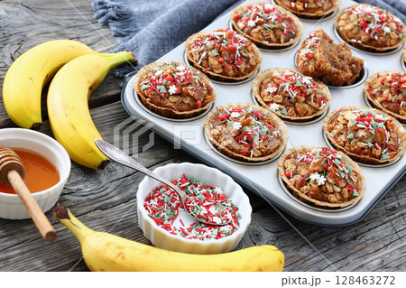 banana bread oat muffins with christmas sprinkles banana bread oat muffins with christmas sprinkles 128463272