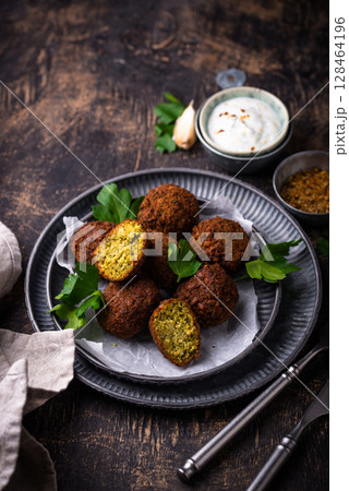 Middle Eastern falafel balls with sauce Middle Eastern falafel balls with sauce 128464196