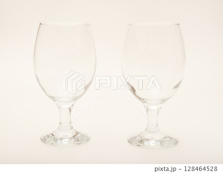 Empty glass glasses. Glassware. Empty glass glasses. Glassware. 128464528