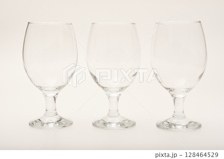 Empty glass glasses. Glassware. Empty glass glasses. Glassware. 128464529