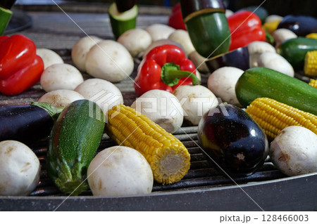 Corn, zucchini, aubergines, peppers, champignon mushrooms. Healthy vegetables Corn, zucchini, aubergines, peppers, champignon mushrooms. Healthy vegetables 128466003