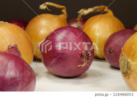 Bulb onion and red onion, which is also called purple onion Bulb onion and red onion, which is also called purple onion 128466053