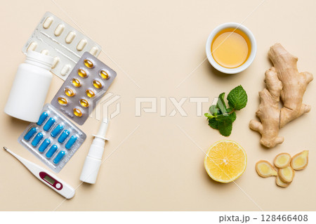 Natural cold and flu home remedies. Natural ingredients for immunity stimulation and viruses protection. top view flat lay 128466408