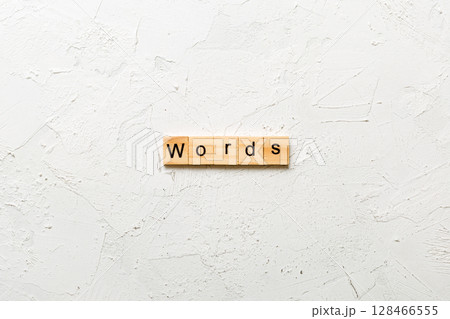 word written on wood block. WORD text on cement table for your desing, concept word written on wood block. WORD text on cement table for your desing, concept 128466555