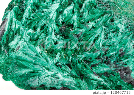 Macro mineral stone plisoviy, plush, satin malachite on a white background 128467713