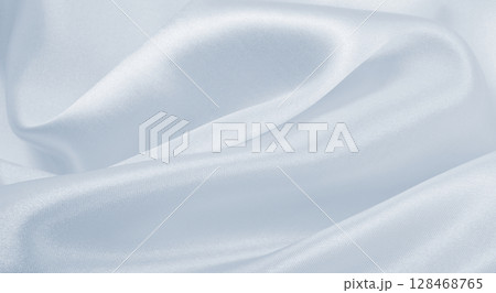 Smooth elegant grey silk or satin luxury cloth as wedding background. Luxurious background design 128468765
